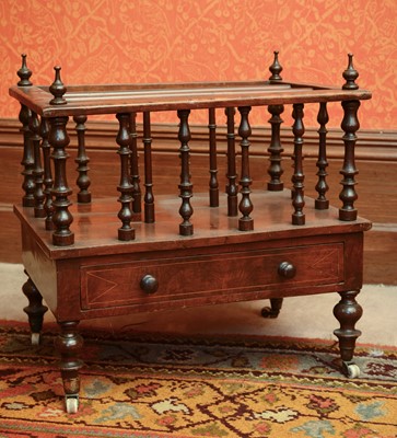 Lot 194 - A Victorian walnut canterbury