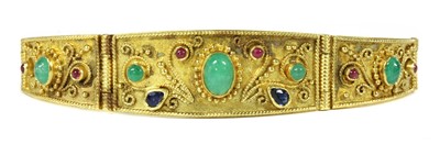 Lot 188 - A gold emerald, sapphire and ruby bracelet