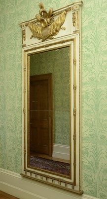 Lot 45 - A large cream and gilt trumeau wall mirror