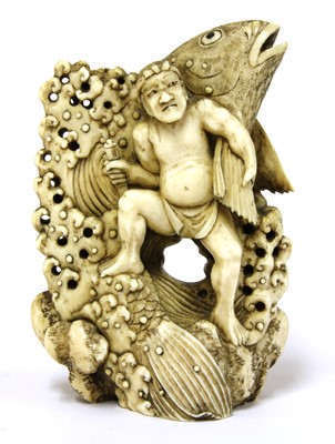 Lot 299 - A Japanese ivory okinomo