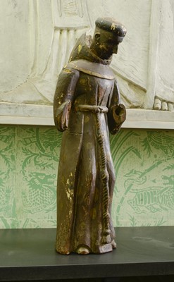 Lot 43 - A carved wooden and painted figure of a monk