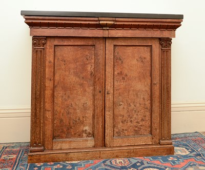 Lot 298 - A George IV oak cupboard