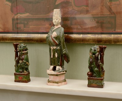 Lot 358 - A Chinese pottery figure