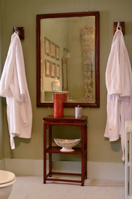Lot 365 - A Chinese hardwood wall mirror