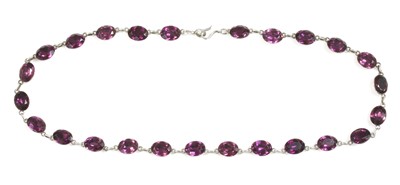 Lot 6 - A Georgian silver and purple paste set rivière, c.1800-1820