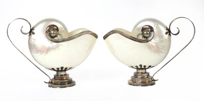Lot 29 - A pair of Tiffany sterling silver-mounted shell ewers
