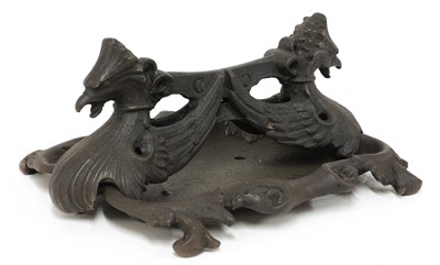 Lot 279 - A cast iron boot scraper by Coalbrookdale