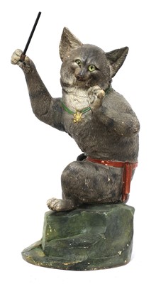 Lot 226 - A French painted terracotta figure of a cat conductor