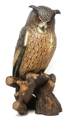 Lot 229 - A large painted terracotta model of a long-eared owl