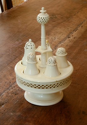Lot 329 - A creamware cruet set