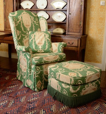 Lot 229 - A high wingback armchair