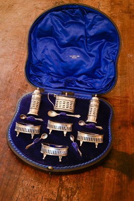 Lot 143 - A cased Edward VII silver cruet set