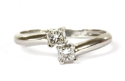 Lot 223 - A platinum two stone diamond ring