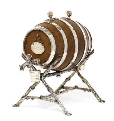 Lot 33 - A simulated oak and silver-plated spirit waggon