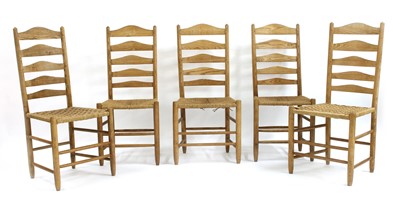 Lot 106 - Five ash ladderback chairs