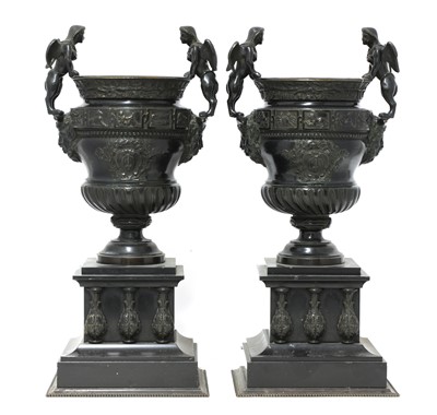 Lot 131 - A pair of French bronze and marble garniture urns