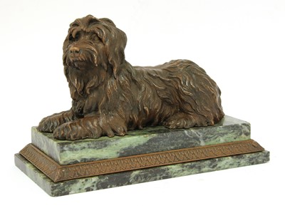 Lot 343 - A bronze figure of a recumbent terrier