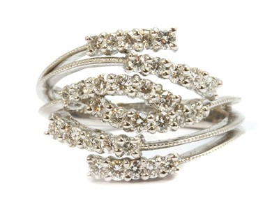 Lot 163 - A platinum six row diamond ring