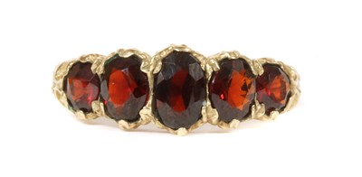 Lot 280 - A 9ct gold five stone garnet ring