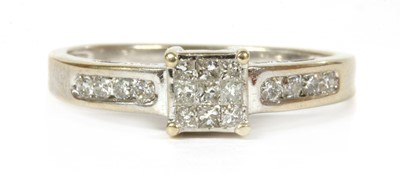 Lot 234 - An 18ct white gold diamond cluster ring