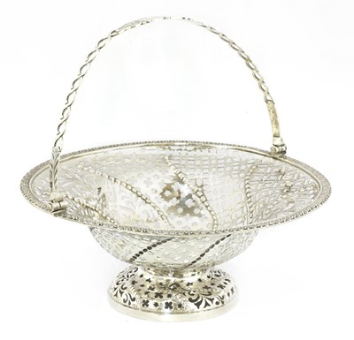 Lot 49 - A George III silver cake basket
