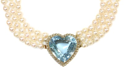 Lot 299 - A three row cultured pearl necklace