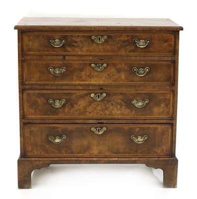 Lot 373 - A George II-style walnut chest of drawers