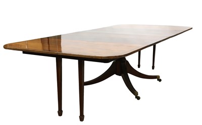 Lot 979 - A George III mahogany extending pedestal dining table