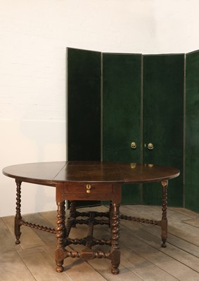 Lot 380 - A rare, large and documented, oak and mahogany gateleg dining table