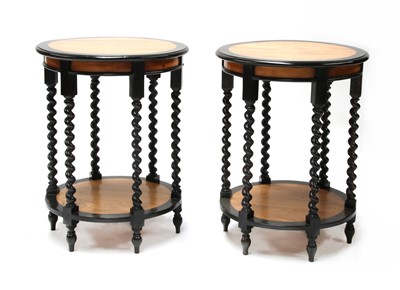 Lot 894 - A pair of Sri Lankan ebony and satinwood lamp tables
