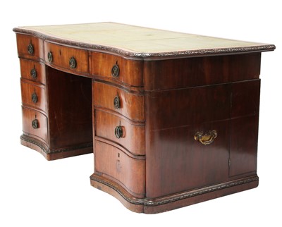 Lot 132 - A Chippendale period mahogany twin pedestal desk