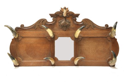 Lot 333 - A French carved oak coat rack
