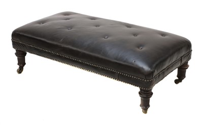 Lot 81 - An oak-framed footstool
