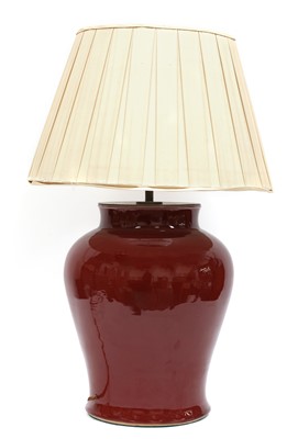 Lot 231 - A large Chinese-style red-glazed porcelain table lamp