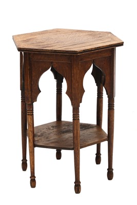 Lot 22 - An Arts and Crafts hexagonal oak lamp table