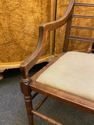 Lot 44 - A set of twelve Arts and Crafts walnut chairs