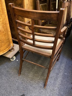 Lot 44 - A set of twelve Arts and Crafts walnut chairs