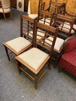 Lot 44 - A set of twelve Arts and Crafts walnut chairs