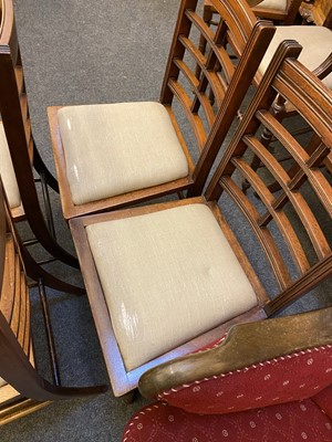 Lot 44 - A set of twelve Arts and Crafts walnut chairs