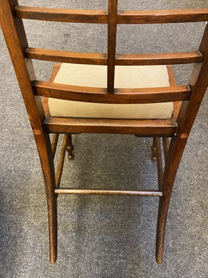 Lot 44 - A set of twelve Arts and Crafts walnut chairs
