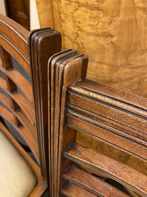 Lot 44 - A set of twelve Arts and Crafts walnut chairs