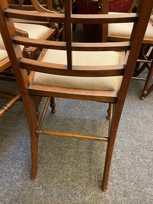 Lot 44 - A set of twelve Arts and Crafts walnut chairs