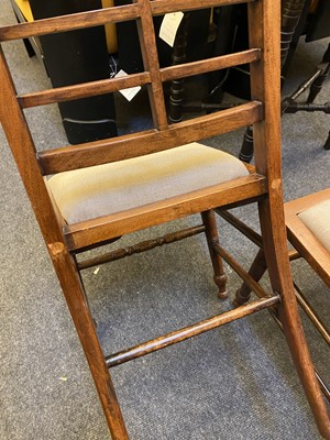 Lot 44 - A set of twelve Arts and Crafts walnut chairs