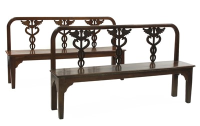 Lot 110 - A pair of Italian neoclassical-style walnut hall seats