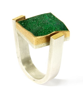 Lot 239 - A 22ct gold, sterling silver, and uvavorite garnet drusy ring by Josef Koppmann
