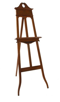 Lot 968 - An Edwardian solid satinwood easel