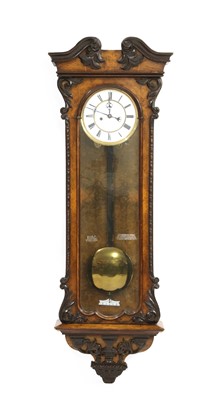 Lot 445 - A walnut Vienna wall clock