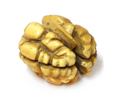 Lot 892 - A Japanese carved ivory netsuke