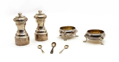 Lot 257 - A pair of silver pepperetts