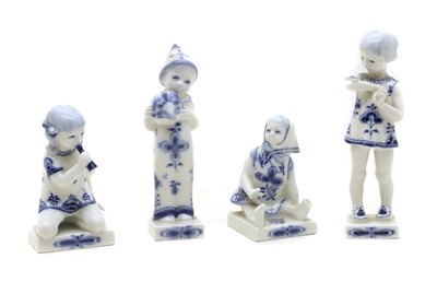 Lot 462A - A collection of four Royal Copenhagen blue and white porcelain figures